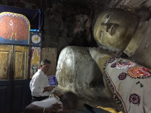 The incumbent Buddha carved into the granite cave