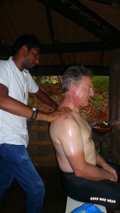 Neck and shoulder massage - spot the cyclist.